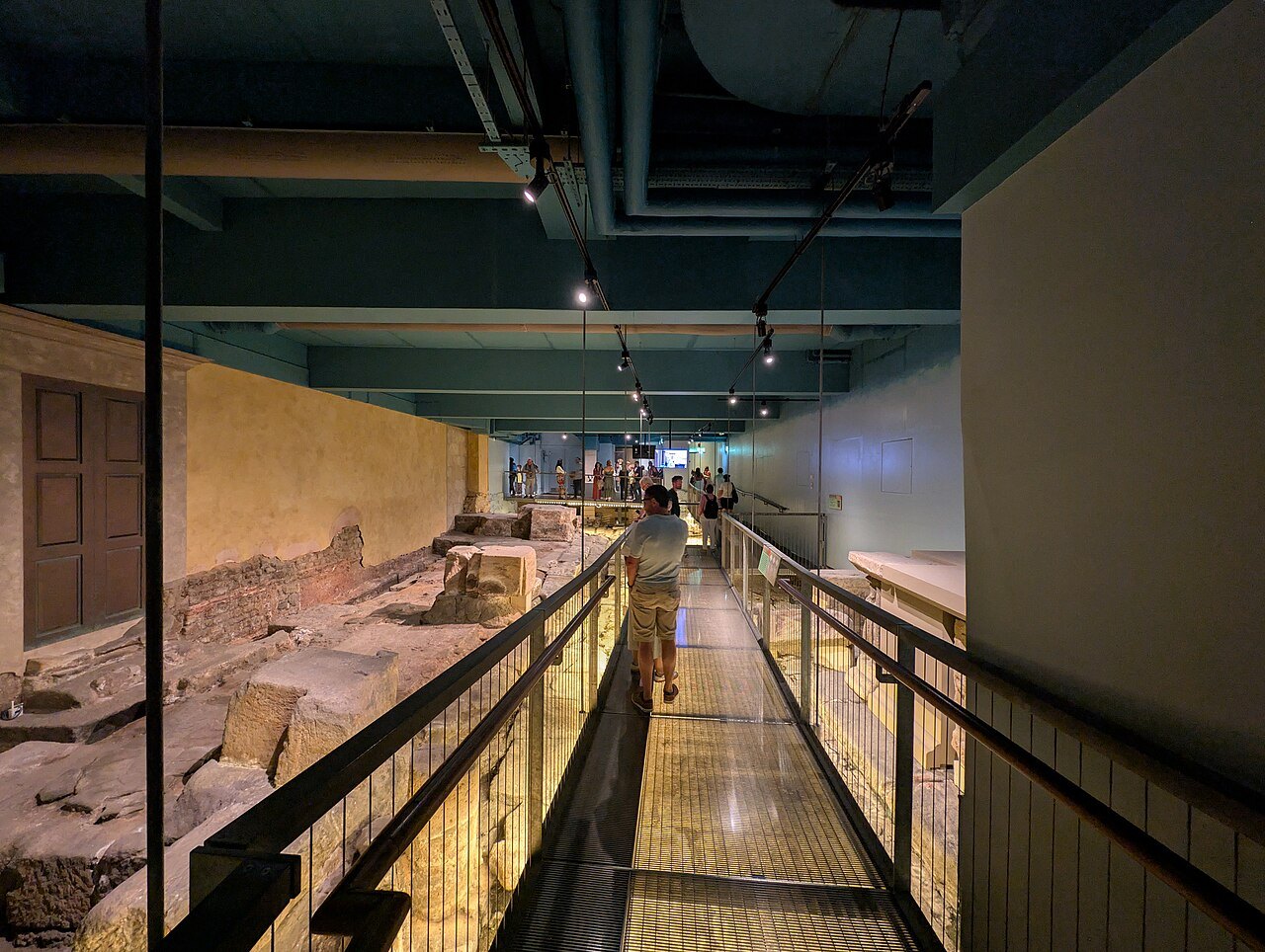 A raised walkway through the excavated remains below the Roman Baths at Bath