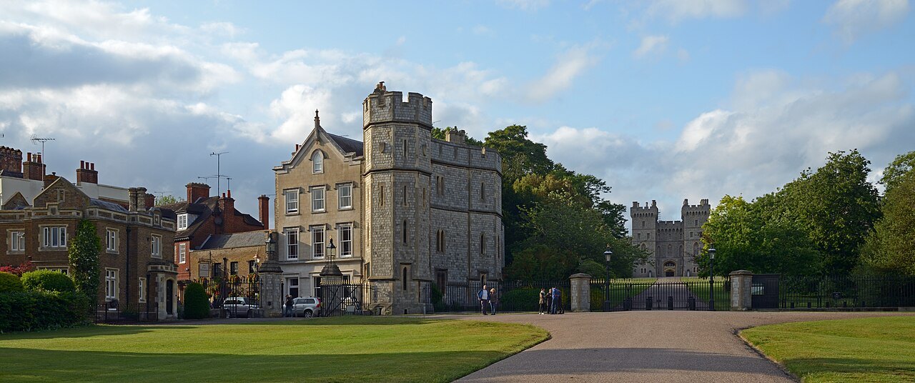 Windsor Castle seen from the Long Walk across the grass of Windsor Great Park