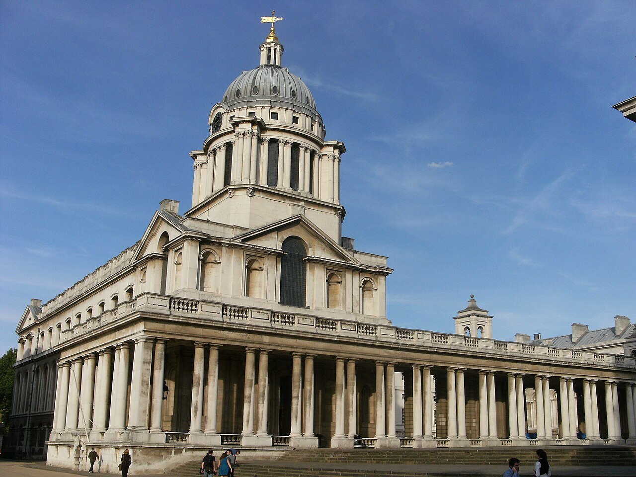 The domed front of Queen Mary Court at the Old Royal Naval College, framed by a colonnade