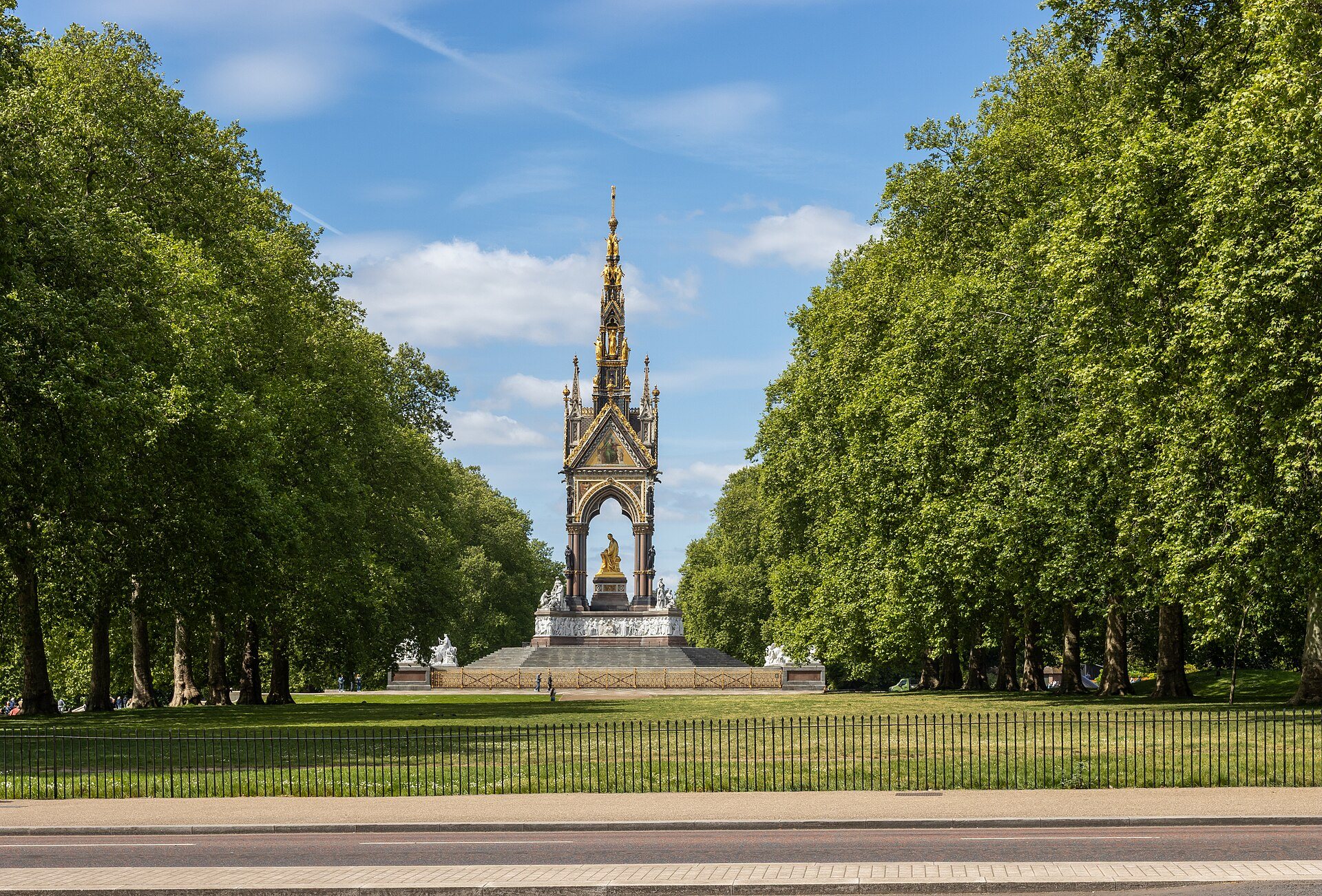 The Albert Memorial at the end of an avenue of trees in Kensington Gardens