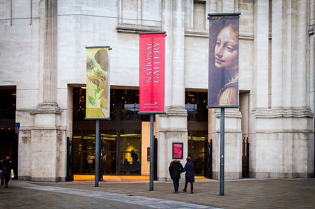 The entrance of the National Gallery with banners hanging at either side of the doorway