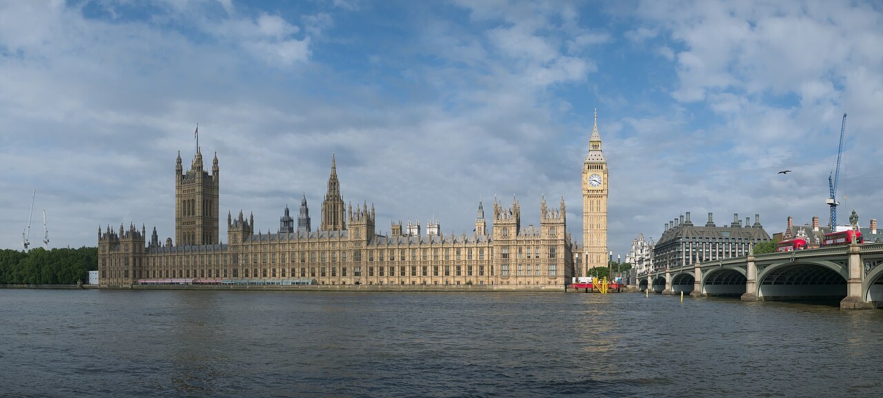 The Palace of Westminster and the Elizabeth Tower seen across the Thames, with Westminster Bridge at the right