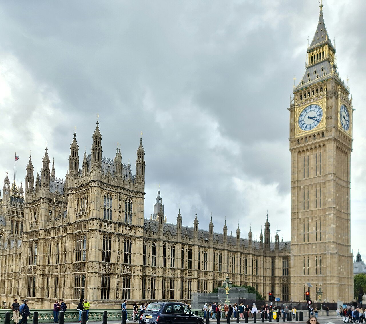 The Elizabeth Tower and the Palace of Westminster seen from the street beside Westminster Bridge