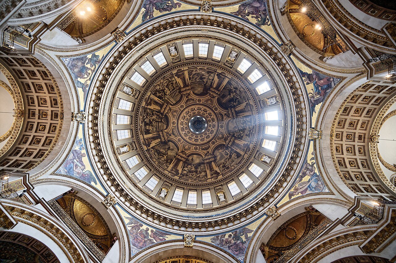 The dome of St Paul's from below, the ring of windows and the gold and blue pendentives around it