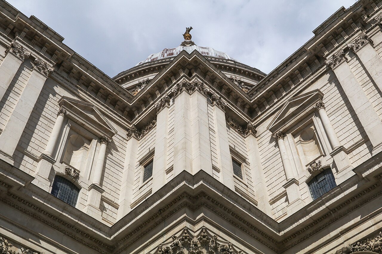 The south front of St Paul's Cathedral seen from the courtyard, rising steeply with its pediments and dome