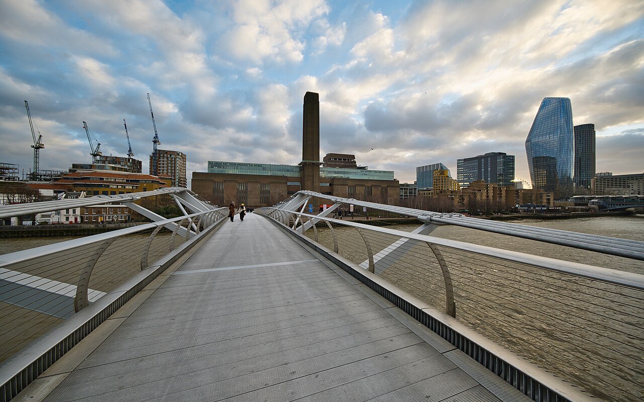 The deck of the Millennium Bridge running toward Tate Modern and the City across the river