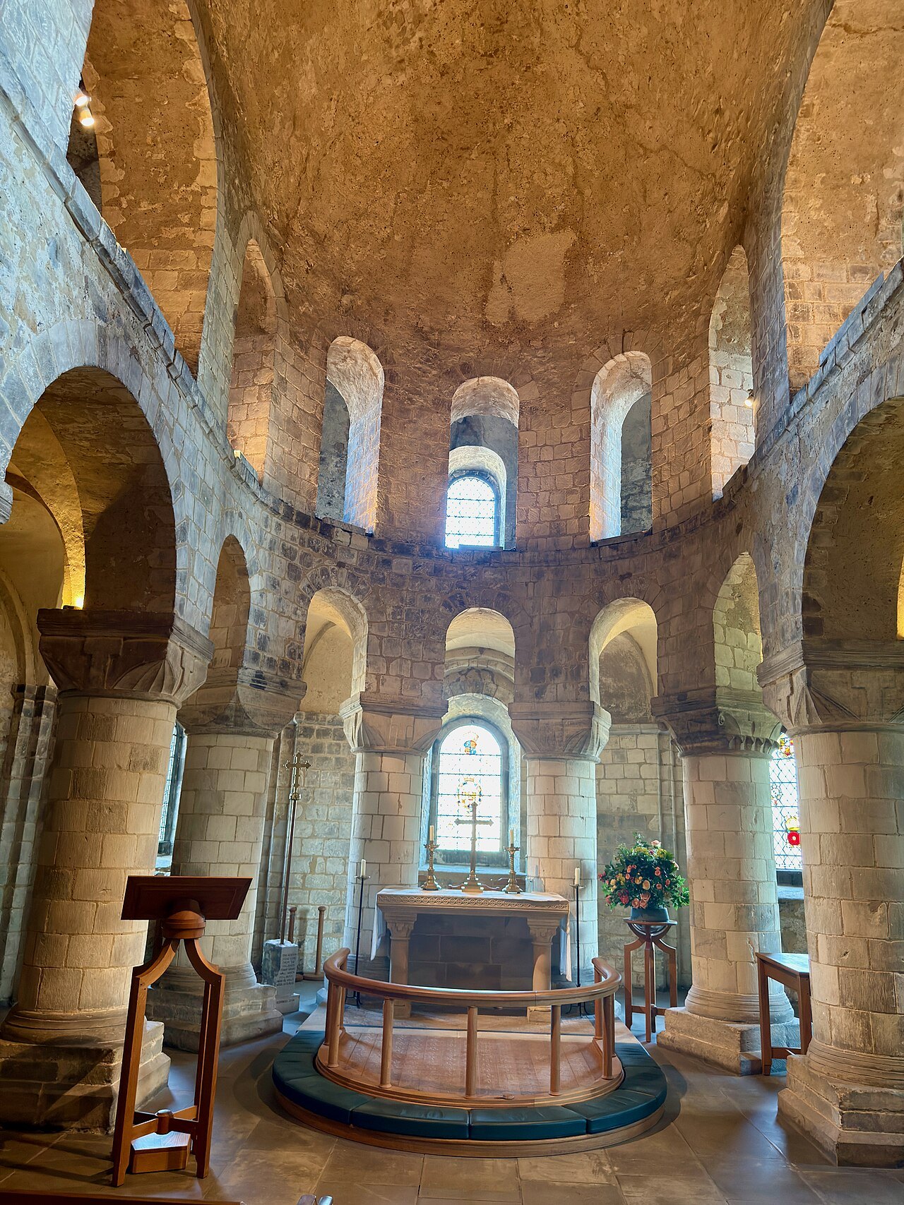 The round Norman chapel inside the White Tower, with its arches and plain stone altar