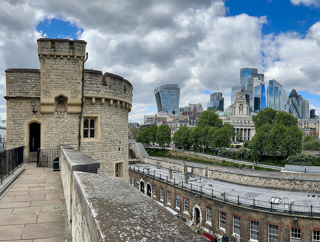 Bowyer Tower on the wall walk, with the glass towers of the City beyond