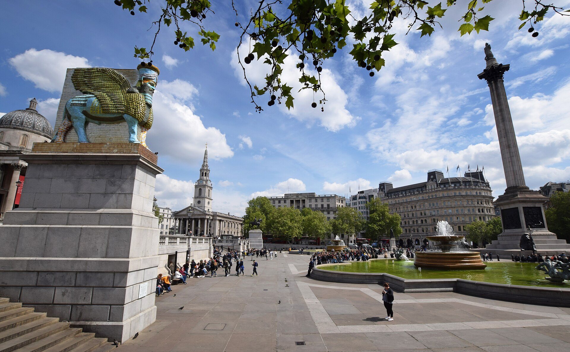 Trafalgar Square seen from beside the fourth plinth, with Nelson's Column at the right and the fountain beyond